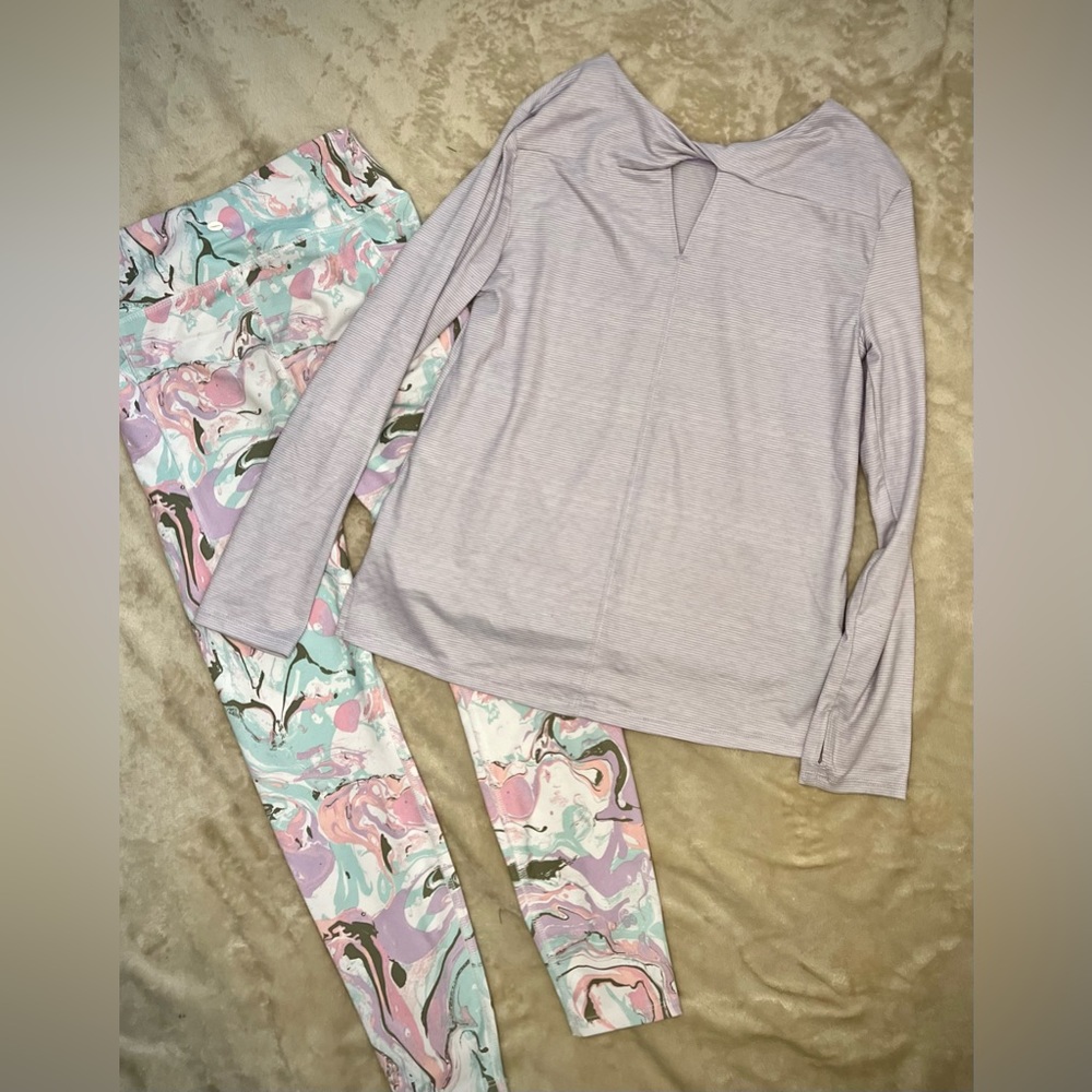 Girls activewear set by Avia.  Purple long sleeve top with athletic pants.